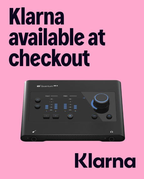 Black electronic device with control panel on a pink background, featuring Klarna branding.