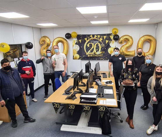 The Inta Auido staff celebrate 20 years in business