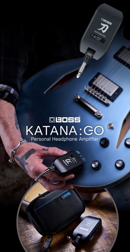 BOSS Katana:GO personal headphone amplifier with a guitar and cable on a wooden surface