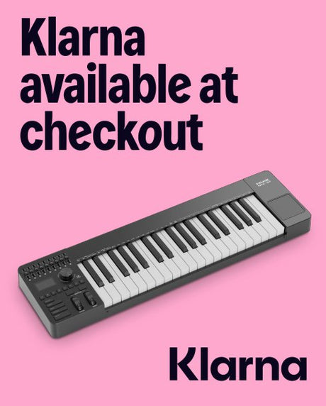 Keyboard with Klarna branding on a pink background