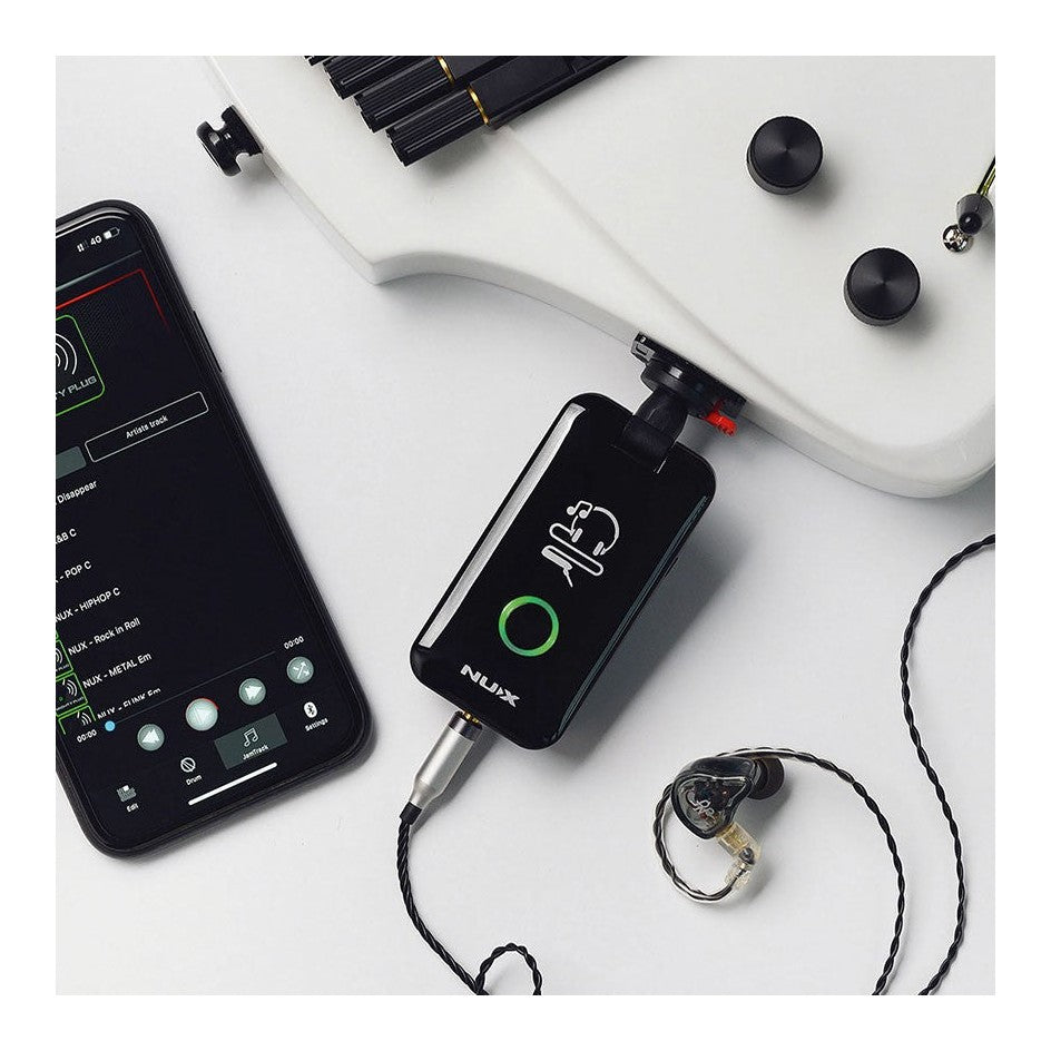 NUX Mighty Plug Lifestyle Shot Guitar Phone and Earphones