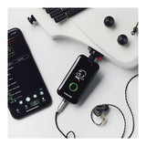 NUX Mighty Plug Lifestyle Shot Guitar Phone and Earphones