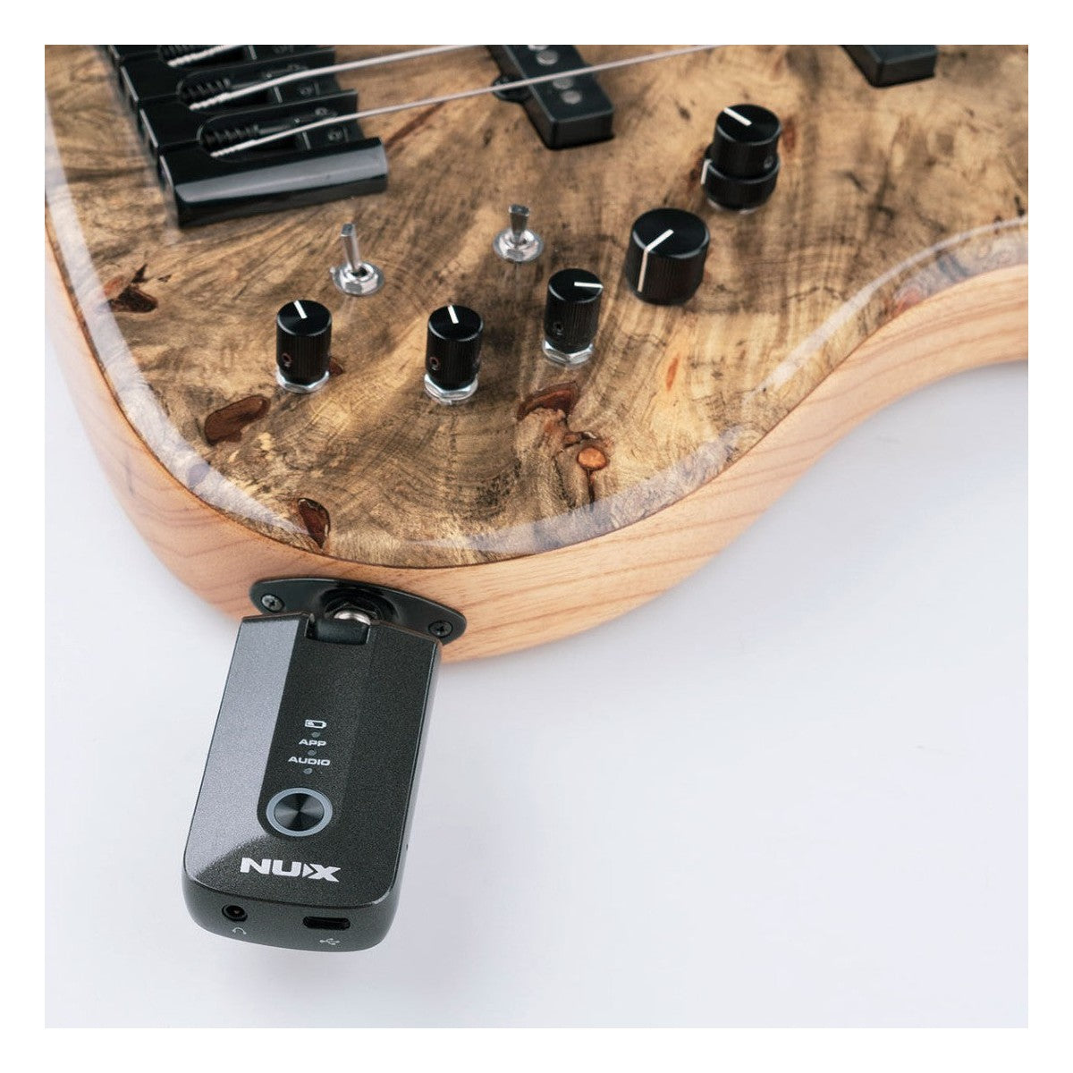 NUX Mighty Plug Pro Lifestyle Shot Plugged Into Guitar