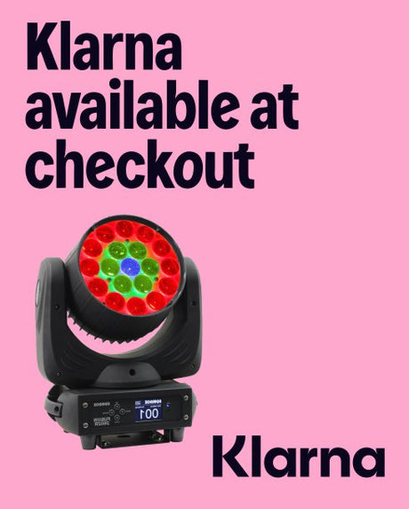 Lighting fixture with Klarna branding on a pink background